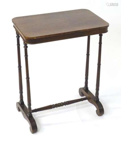 A mid 19thC rosewood side table, having an oblong top above ...