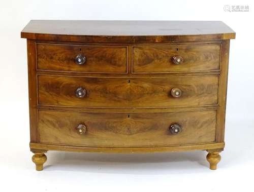 An early / mid 19thC mahogany chest of drawers comprising tw...