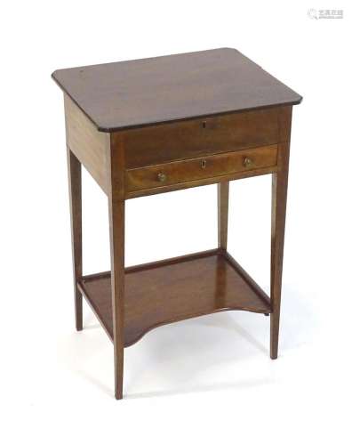 An early 19thC mahogany side table with a hinged lid above a...