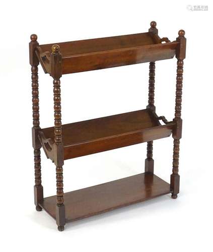 A late 19thC walnut bobbin turned three tier bookshelf, the ...