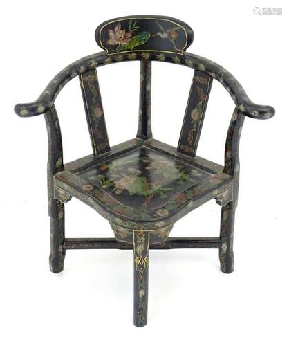 An early 20thC Oriental style black lacquered childs chair w...