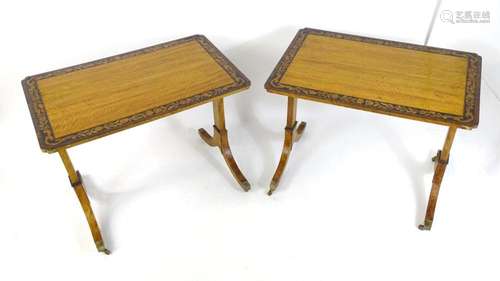 A pair of satinwood tables with crossbanded edges and an ebo...