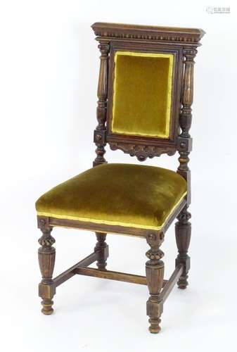 A late 19thC / early 20thC oak side chair, having egg and da...