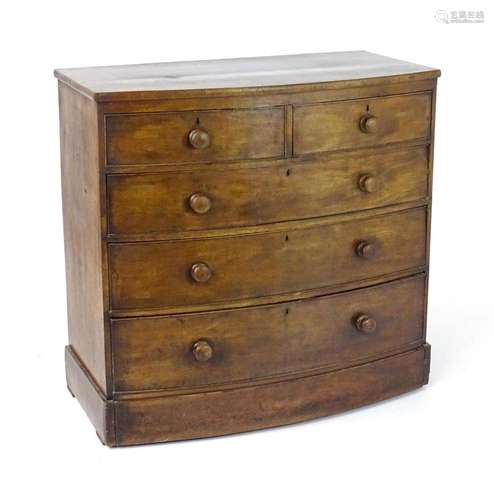 A 19thC mahogany bow fronted chest of drawers, comprising tw...