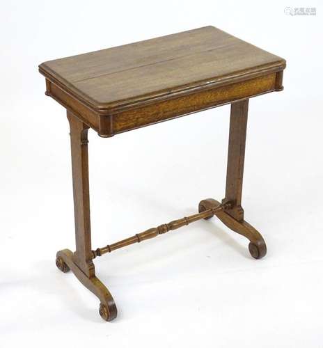 A Victorian oak card table with a moulded, revolving and fol...