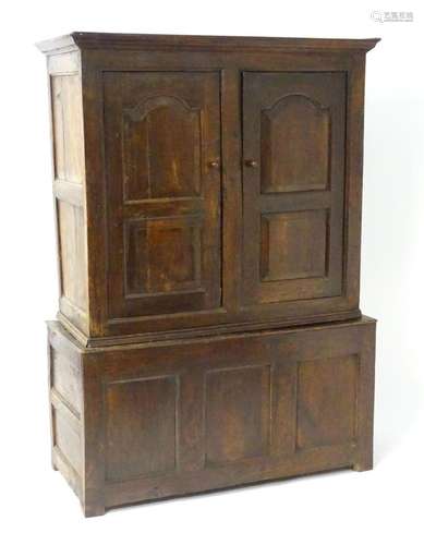 A 17thC and later oak livery cupboard of peg jointed constru...