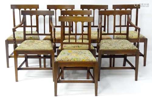 A set of eight Georgian mahogany dining chairs, having inlai...