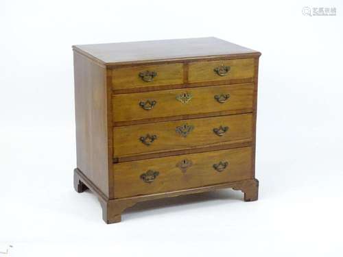 A late 18thC mahogany chest of drawers with a moulded top ab...