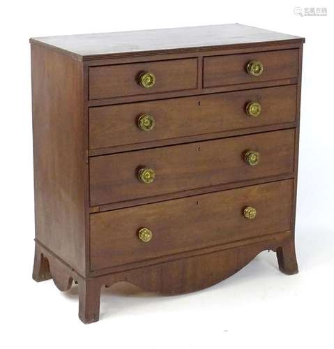 An early 19thC mahogany chest of drawers with a reeded top e...