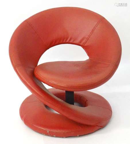 A Modernist style spiral chair in the manner of Louis Durot....