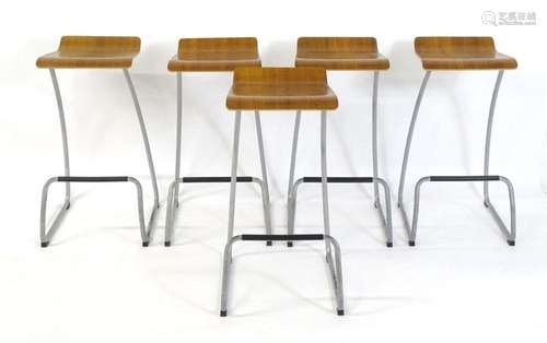 A set of five stools with metal frames and wooden seats. 31&...