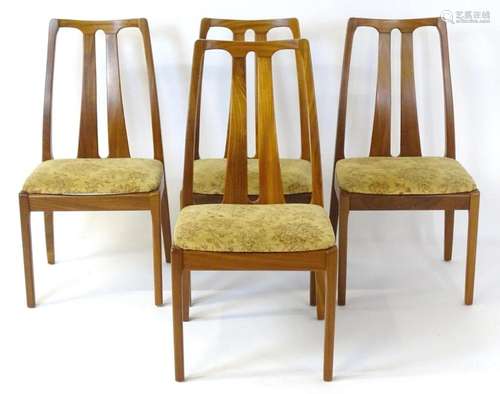 Vintage / Retro: A set of four teak Nathan dining chairs, ha...