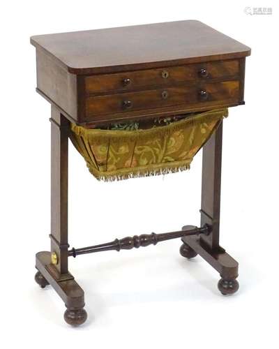 A Regency mahogany work table with a rectangular top above t...