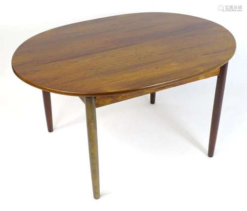 Vintage / Retro: An extending rosewood dining table of oval ...