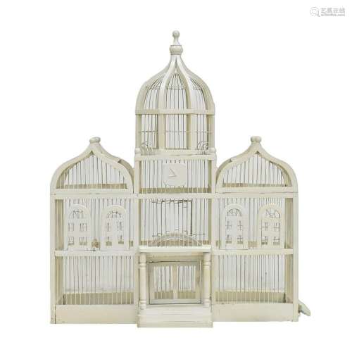 A WHITE PAINTED BIRD CAGE