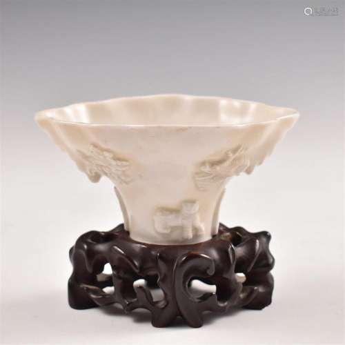 A FINE CHINESE QING LIBATION CUP ON STAND. "