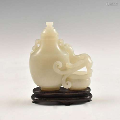 A CHINESE WHITE JADE VASE WITH LID AND STAND
