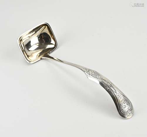 Silver serving spoon