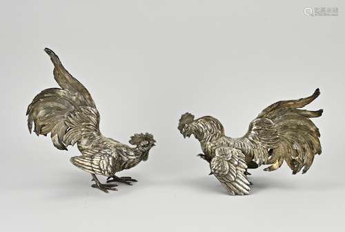 Two silver roosters