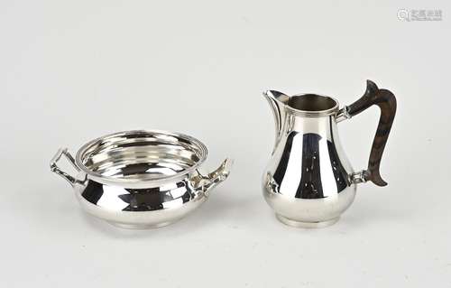 Silver milk jug and sugar bowl