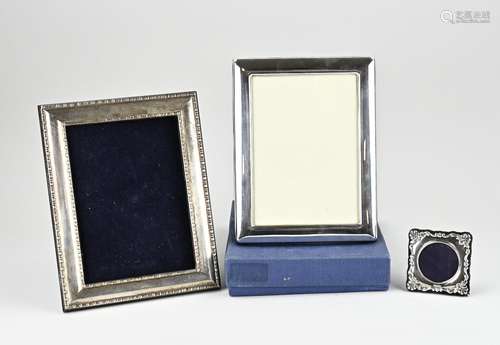 Three silver picture frames