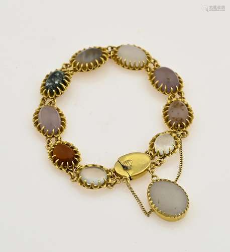 Gold bracelet with gemstones