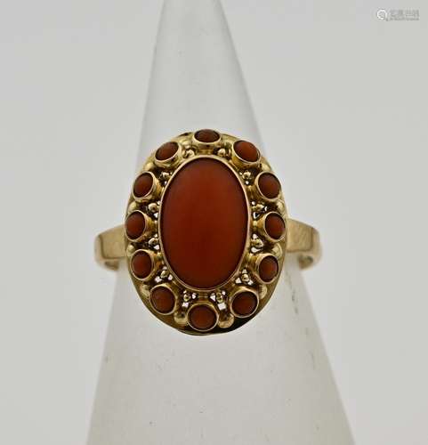 Gold ring with red coral