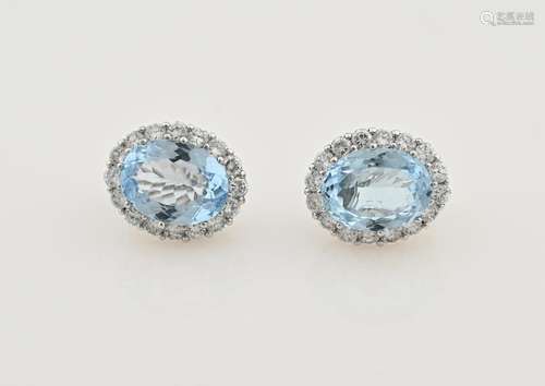 Silver earclips with zirconia and blue topaz