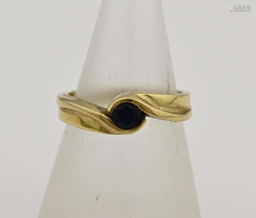 Gold ring with sapphire