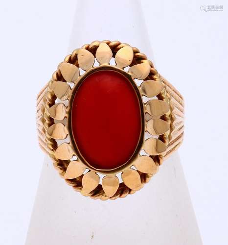 Gold ring with red coral