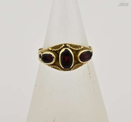 Gold ring with garnet