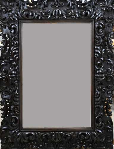 Carved frame with mirror, H 84 x W 65 cm.