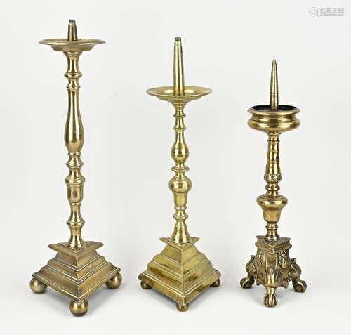 Three antique pen candlesticks