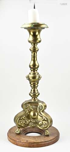 Brass candlestick, H 94 cm.