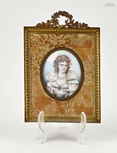 Portrait in gilded frame