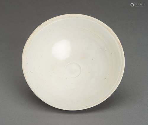 † A WHITE GLAZED PORCELAIN BOWL