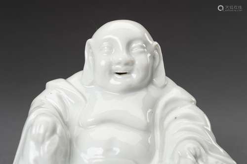 A BLANC DE CHINE PORCELAIN FIGURE OF BUDAI, c. 1920s