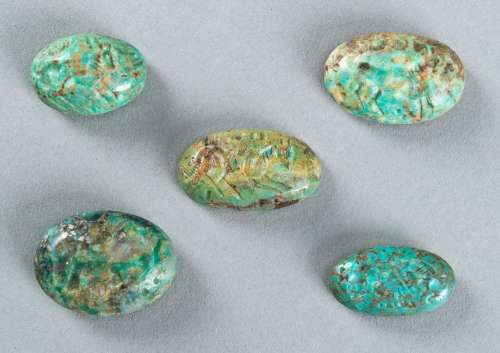 A GROUP OF FIVE PERSIAN TURQUOISE INTAGLIO SEALS