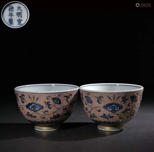 Pair of hand-painted floral cups with pink glaze