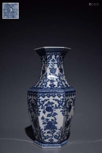 Blue and white hexagonal vase with floral pattern