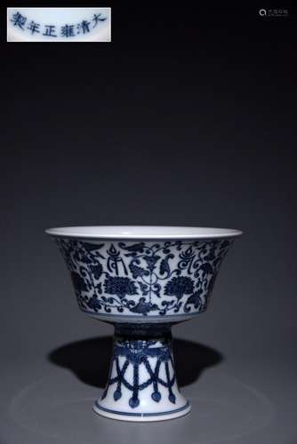 Goblet with blue and white twisted branches and floral patte...