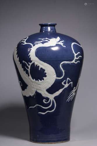 Blue-glazed plum vase with white dragon pattern