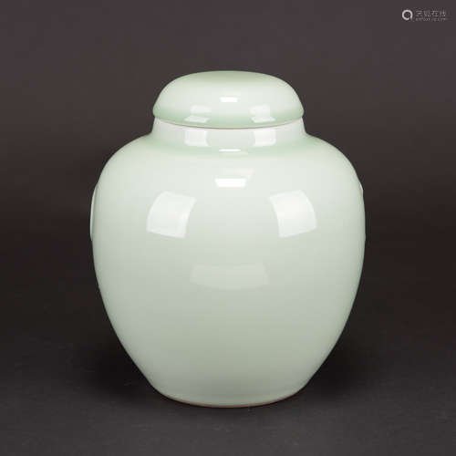 A CELADON GLAZED JAR AND COVER