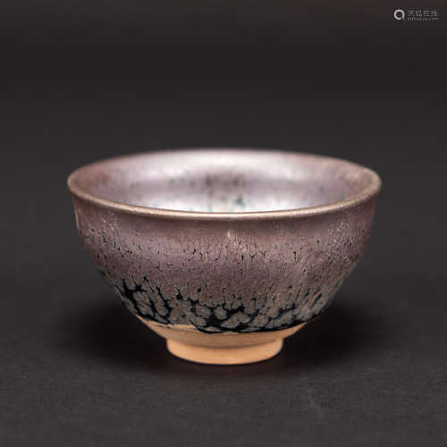 A BLACK GLAZED PROCELAIN BOWL