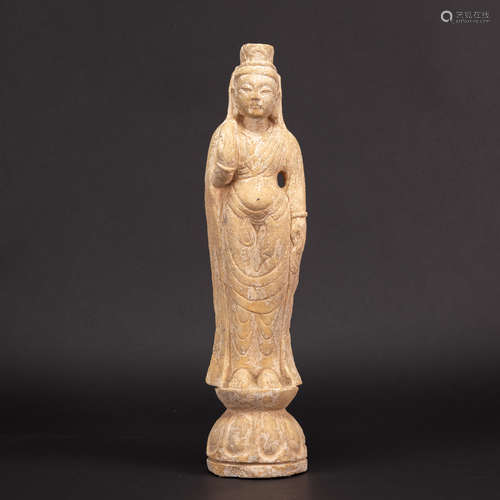 A TANG STYTLE CARVED STONE FIGURE OF ATTENDANT