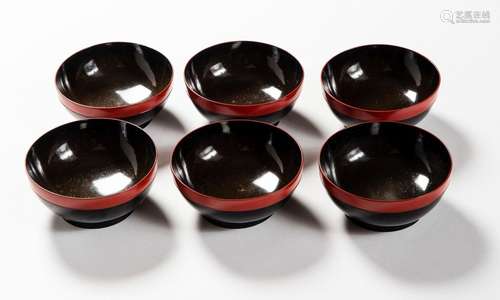 SIX RED AND BLACK LACQUERED BOWLS