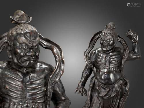 † A PAIR OF MONUMENTAL BRONZE NIO GUARDIANS, DATED 1783 BY I...