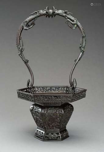 A BRONZE IKEBANA BASKET