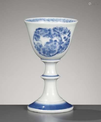A HIRADO BLUE AND WHITE STEM CUP WITH FLORAL ROUNDELS