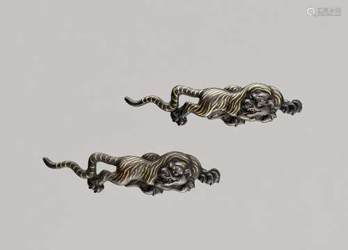 A LARGE PAIR OF SHAKUDO MENUKI DEPICTING TIGERS